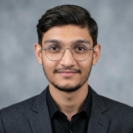 Portrait of Aahad Ali in a modern workplace
